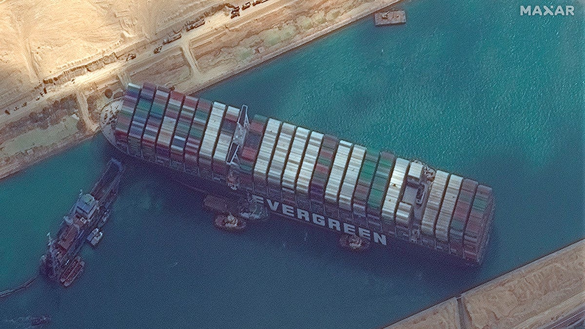 The cargo ship MV Ever Given was freed in the Suez Canal near Suez, Egypt, on Monday. Experts are now investigating what caused the massive vessel to run aground. (©Maxar Technologies via AP)
