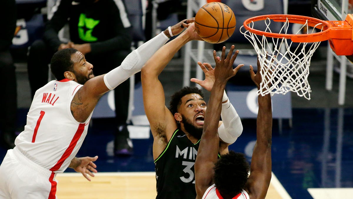 Karl-Anthony Towns shoots against Houston Rockets