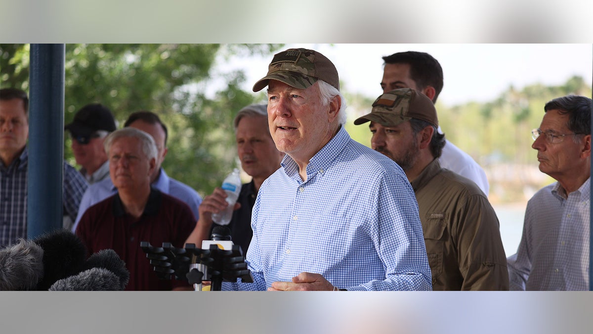 Sen. John Cornyn, R-Texas, speaks to the media after a tour of part of the Rio Grande river on a Texas Department of Public Safety boat on March 26, 2021 in Mission, Texas. (Photo by Joe Raedle/Getty Images)