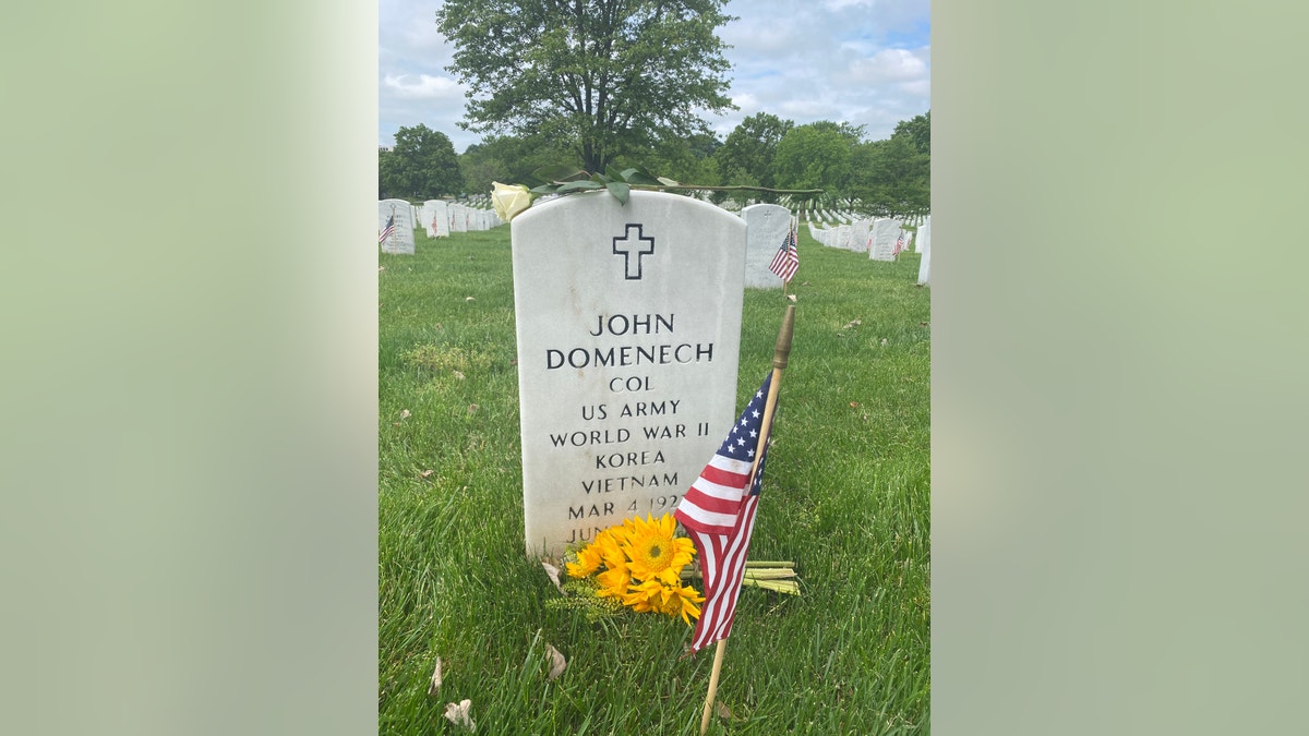 The headstone at Arlington Cemetery of Emily Domenech's grandfather