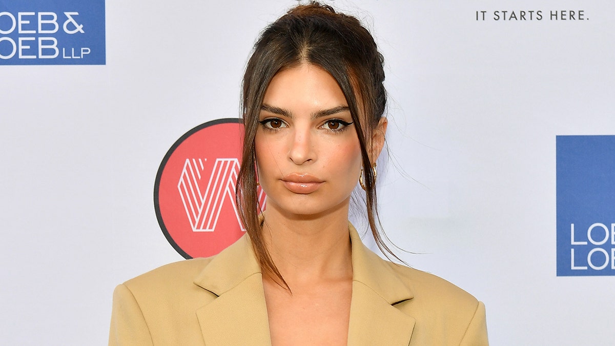 Emily Ratajkowski's recent Instagram caption calling her child a 'boy' after saying she 'won’t know the [baby's] gender until our child is 18' drew attention online. (Photo by Dia Dipasupil/Getty Images)