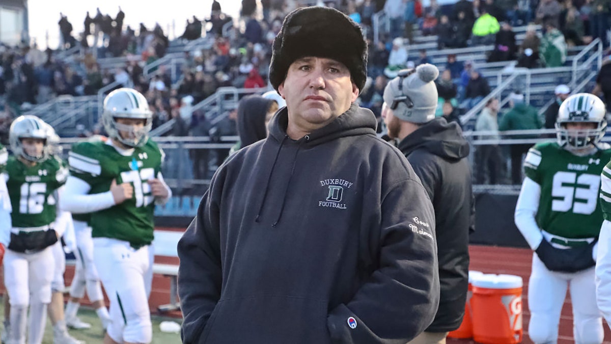 Duxbury High head coach Dave Maimaron on the sidelines against Tewksbury High during the MIAA Division 3 football semifinal at Xaverian Brothers High in Westwood, MA on Nov. 23, 2019. (Photo by Matthew J. Lee/The Boston Globe via Getty Images)