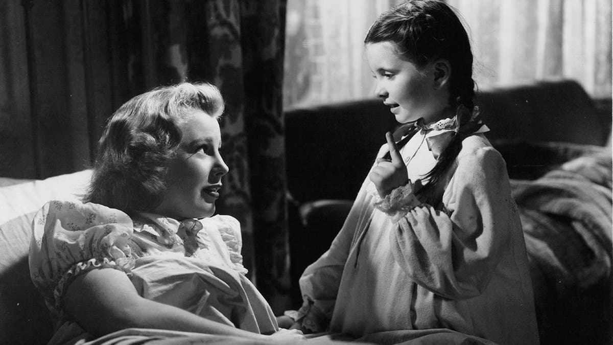 Margaret O'Brien (right) with June Allyson in a scene from the film 'Music For Millions', 1944.