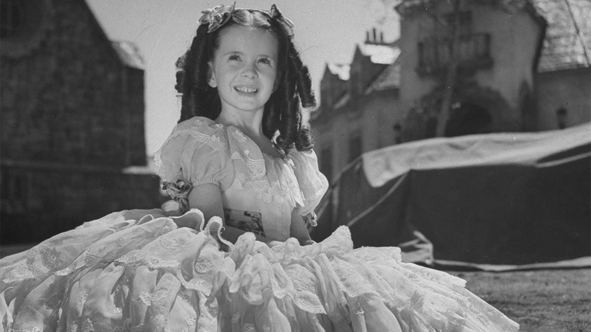 Child film actress Margaret O'Brien on set.