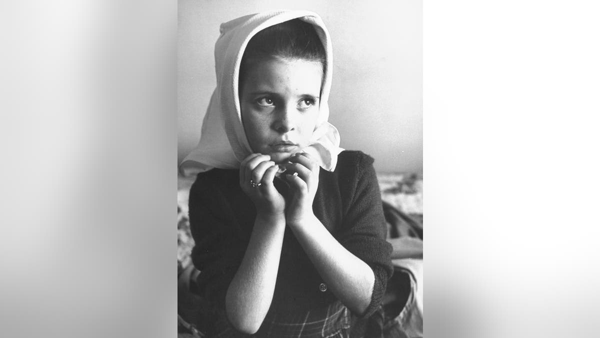 Child star Margaret O'Brien doing an impersonation of actress Jennifer Jones.