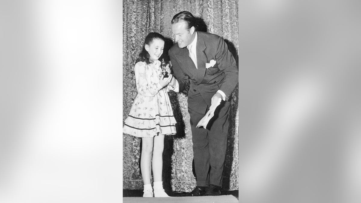 Bob Hope presents Margaret O'Brien with the Academy's first 'Oscarette' in 1944.