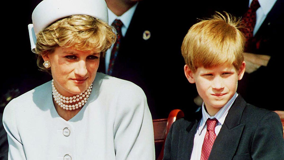 Princess Diana with her son Prince Harry, circa 1995.