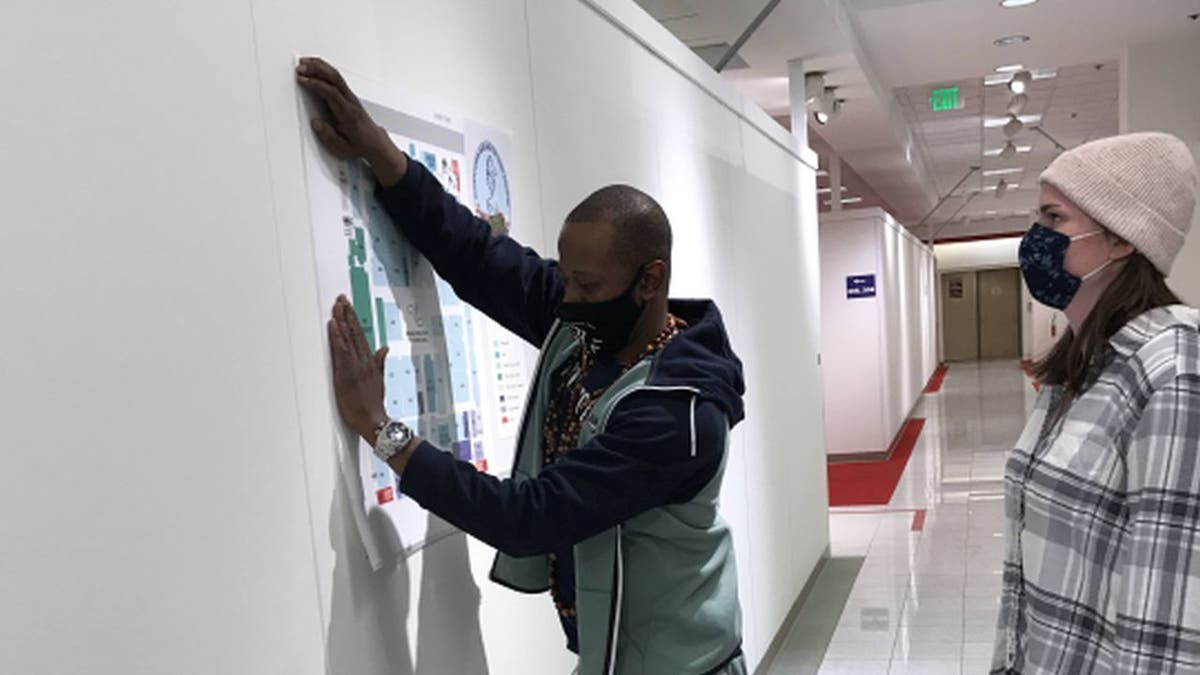 Burlington High School's new home is a retired Macy's store that measures 150,000 square feet. Posted maps help students and staff navigate the space. (Burlington School District)