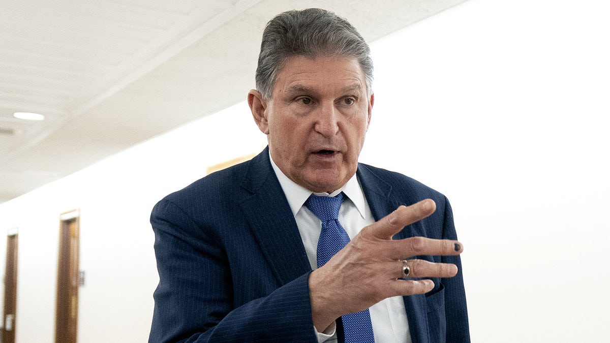 Senator Joe Manchin, a Democrat from West Virginia, speaks to members of the media while departing a bipartisan Senate luncheon in Dirksen Senate Office Building in Washington, D.C., U.S., on Wednesday, March 3, 2021.? Photographer: Stefani Reynolds/Bloomberg via Getty Images