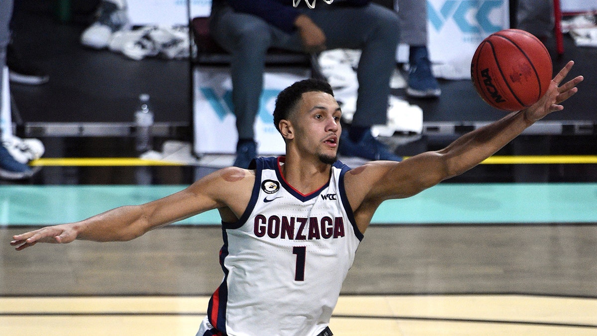 Gonzaga guard Jalen Suggs grabs a rebound against Saint Mary's during the second half of an NCAA semifinal college basketball game at the West Coast Conference tournament Monday, March 8, 2021, in Las Vegas. (AP Photo/David Becker)