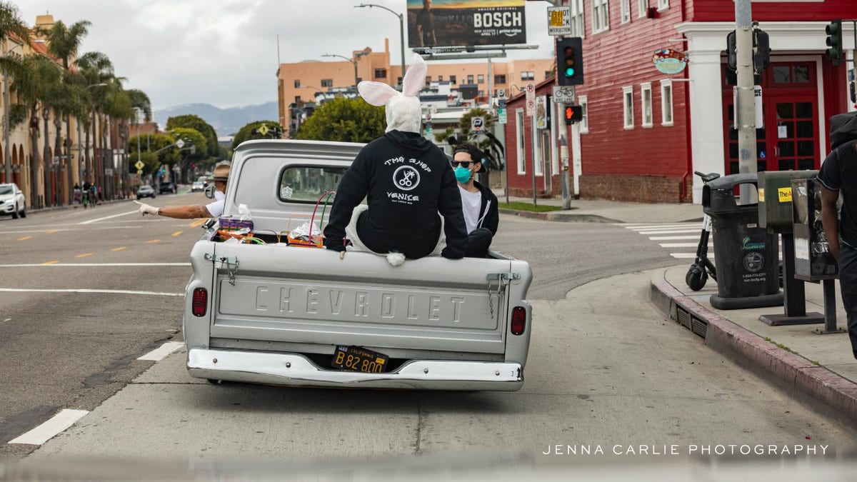 Celebrity men's groomer Jason Schneidman and Blake Levy giving out Easter baskets full of supplies to the homeless in Venice, California.