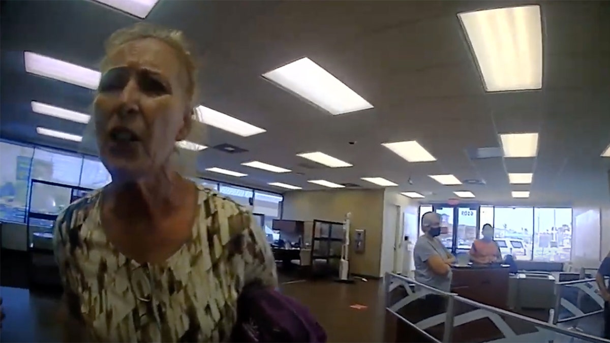 She accused the officer of "taking away people's human rights" in bodycam video of the arrest.
