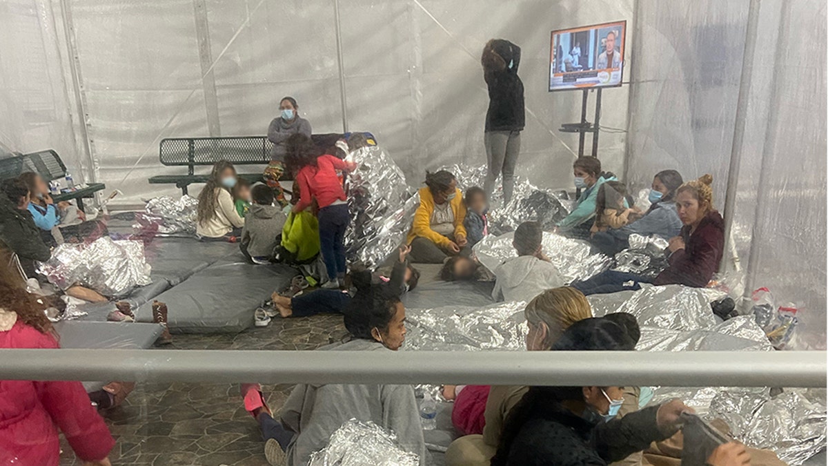 Images of migrants taken Friday, March 26, 2021, at the Donna U.S. Customs and Border Protection (CBP) facility in Texas. Sen. Mike Braun, R-Ind., took the pictures while touring the facility with other GOP senators.