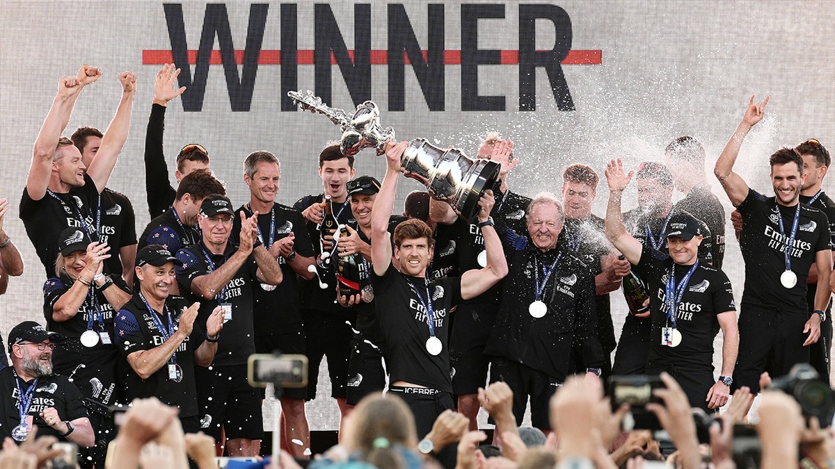 Team New Zealand hoisting America's Cup