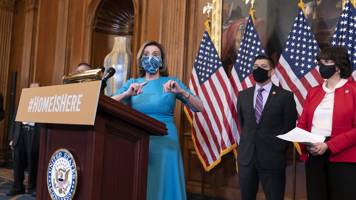 Speaker of the House Nancy Pelosi, D-Calif., joined at right by Rep. Raul Ruiz, D-Calif., chairman of the House Hispanic Caucus, and Rep. Lucille Roybal-Allard, D-Calif., discusses the upcoming vote on the American Dream and Promise Act of 2021, a bill to help reform the immigration system, at the Capitol in Washington, Thursday, March 18, 2021. (AP Photo/J. Scott Applewhite)