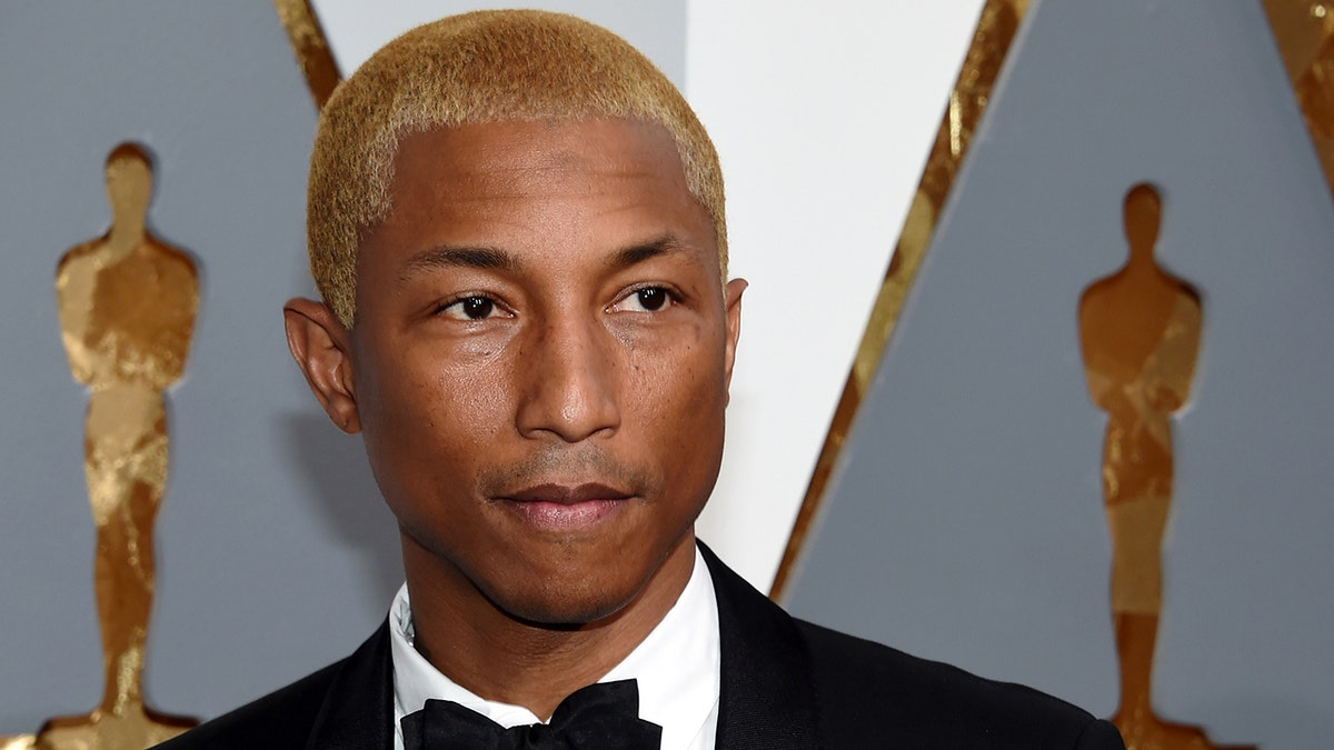 Recording artist Pharrell Williams is opening a network of nonprofit private schools in Virginia. (Photo by Ethan Miller/Getty Images)