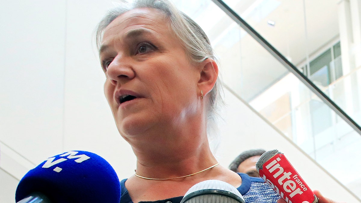 In this Monday, Sept. 23, 2019 file photo, Doctor Irene Frachon, who discovered that the drug Mediator could have fatal side effect, speaks to reporters as she arrived at a Paris courthouse. (AP Photo/Michel Euler)