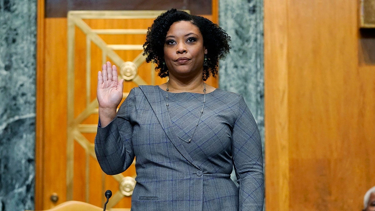 Shalanda Young is sworn in prior to testifying before a Senate Budget Committee hearing to examine her nomination to be Deputy Director of the Office of Management and Budget on Capitol Hill in Washington, Tuesday, March 2, 2021. (AP Photo/Patrick Semansky)