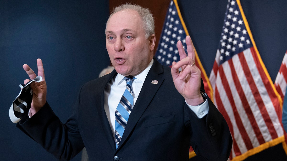 Rep. Steve Scalise, R-La., the House minority whip, gestures as he criticizes Gov. Andrew Cuomo of New York, during a news conference at the Capitol in Washington, Tuesday, March 9, 2021. Rep. Ashley Hinson, R-Iowa, joins at right. (AP Photo/J. Scott Applewhite)