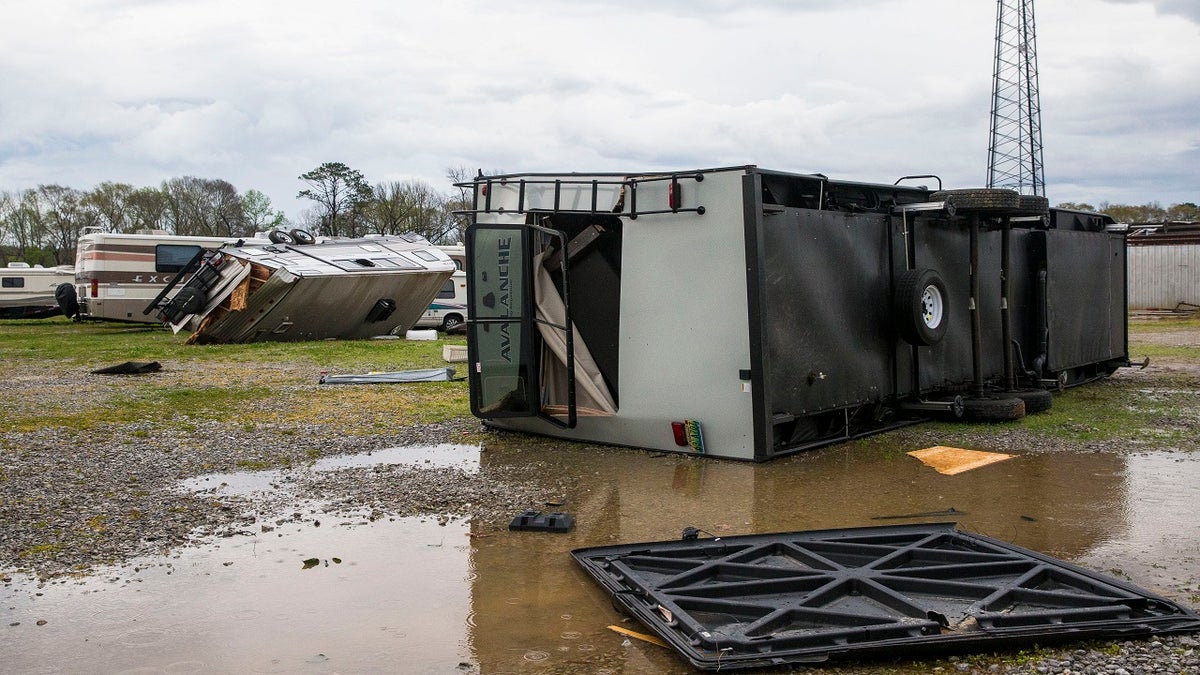AMU RV service and repair was struck by a tornado that destroyed multiple client-owned recreational vehicles on Wednesday in Moundville, Ala. The tornado also tore the roof off the workshop with people inside, who survived. (AP)