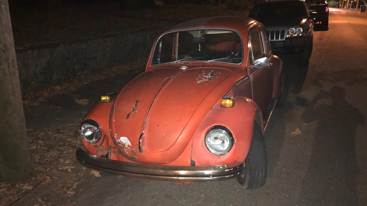 Daphne and John Westbrook may be traveling in this orange 1971 Volkswagen Beetle. 