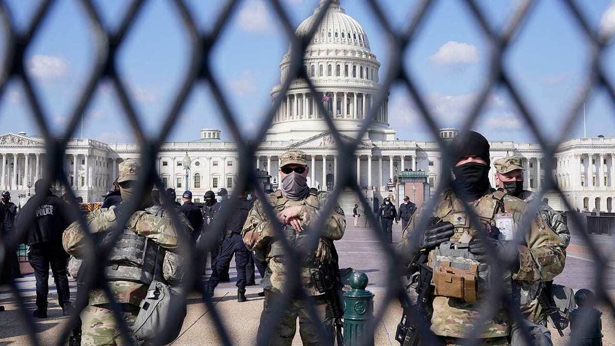 National Guard keep watch on the Capitol, Thursday, March 4, 2021, on Capitol Hill in Washington. (AP Photo/Jacquelyn Martin)