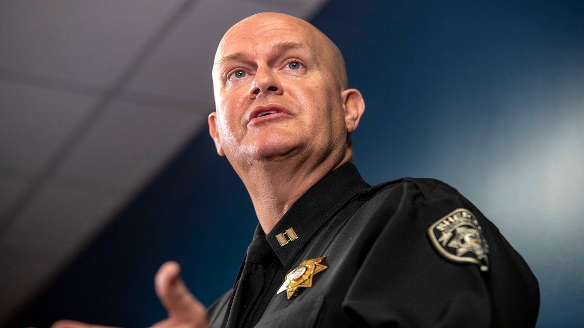 Captain Jay Baker, of the Cherokee County Sheriff's Office, speaks about the arrest of Robert Aaron Long during a press conference at the Atlanta Police Department headquarters in Atlanta, Wednesday, March 17, 2021. (Alyssa Pointer/Atlanta Journal-Constitution via AP)