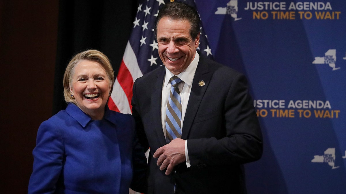 NEW YORK, NY - JANUARY 7: (L-R) Former Secretary of State Hillary Clinton and New York Governor Andrew Cuomo smile at the end of an event to discuss reproductive rights at Barnard College, January 7, 2019 in New York City. The two Democrats shared the stage to promote the Reproductive Health Act in New York, which Cuomo wants the State Legislature to pass in their first 30 days. Under New York's current law, abortions after 24 weeks are illegal unless its necessary to save the woman's life. (Photo by Drew Angerer/Getty Images)