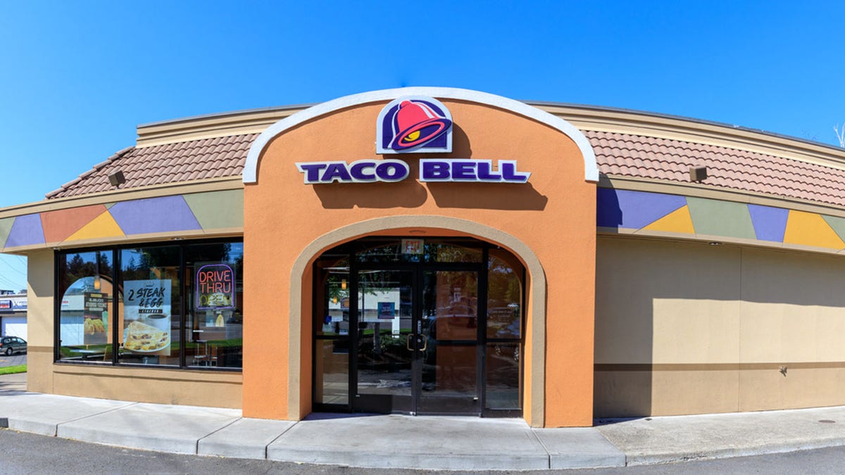 Exterior of Taco Bell fast-food restaurant with sign and logo