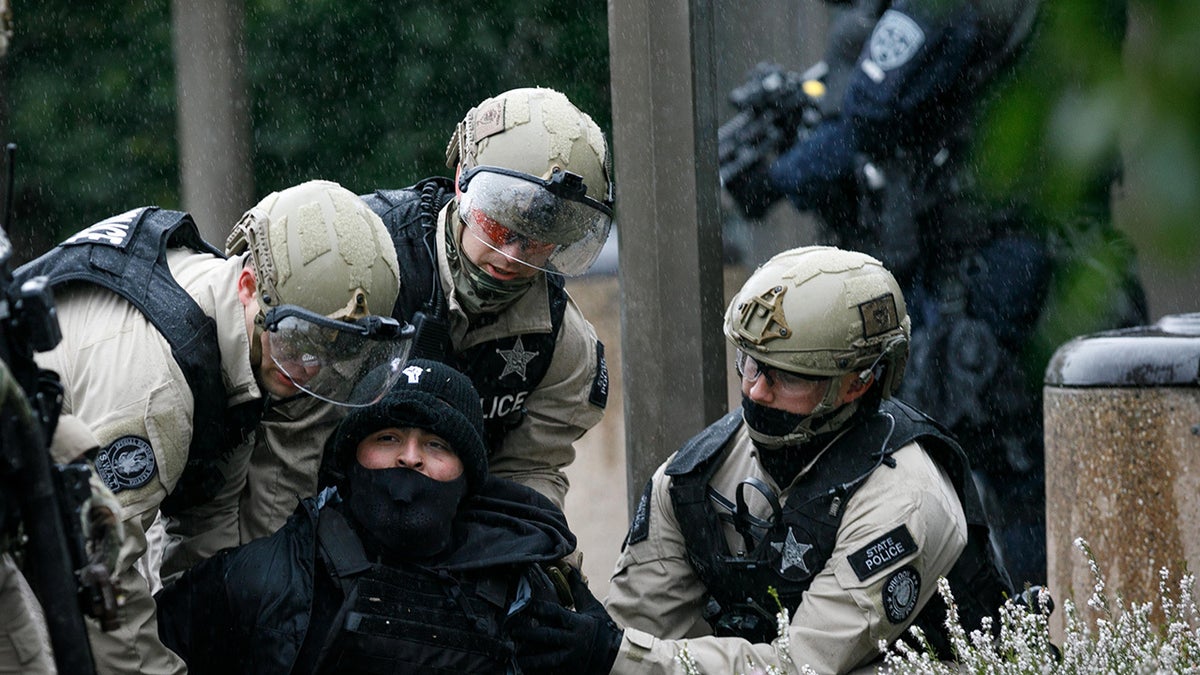 Police made multiple "targeted arrests" in Salem on Sunday.