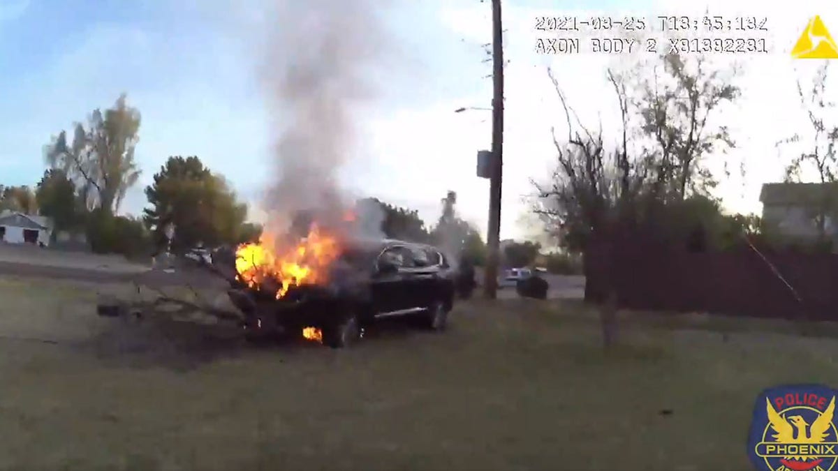 Phoenix police saved a driver trapped inside a burning car last week.