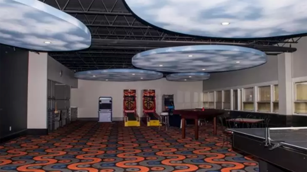 The home also features arcade games and a basketball court.