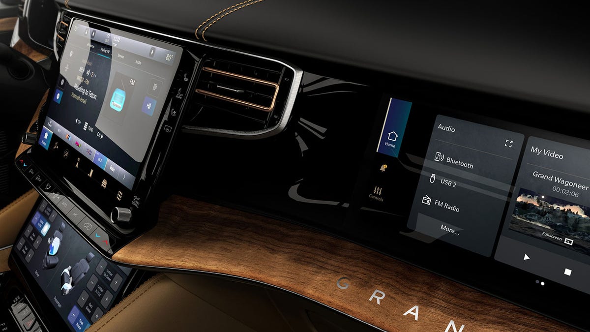 The Grand Wagoneer's passenger-side display can be used to control the infotainment system and watch videos.