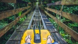 Feet of a young woman on Alpine Coaster.