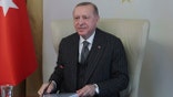 Turkey's President Recep Tayyip Erdogan speaks as he participates in a video conference with European Commission President Ursula von der Leyen and European Council President Charles Michel, from an old Ottoman palace, in Istanbul, Friday, March 19, 2021. (Turkish Presidency via AP, Pool)
