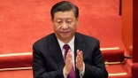 Chinese President Xi Jinping applauds during the closing session of the Chinese People's Political Consultative Conference (CPPCC) at the Great Hall of the People in Beijing, Wednesday, March 10, 2021. (AP Photo/Mark Schiefelbein)