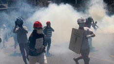 Burma military clash with protesters leaves 18 dead, about 1,000 detained including journalist