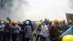 Burma protesters take to streets day after deadly crackdown
