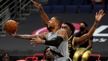 McCollum, Lillard lead Blazers past Raptors 122-117