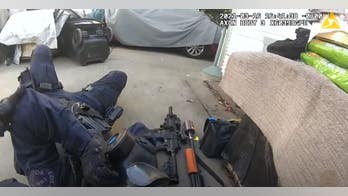 LAPD SWAT officer shot in the face before gunman is killed in standoff, intense video shows