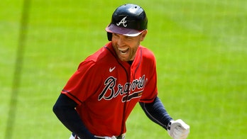 Braves' Freeman celebrates his new baby 'twins with a twist'