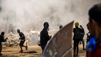 Martial law imposed in parts of Burma city as deaths rise