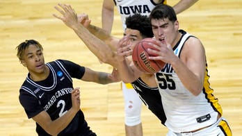 Sharp-shooting Iowa gets 24 from Garza to beat Grand Canyon