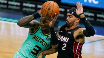 Monk scores 32 as Hornets hold on to beat Heat 110-105