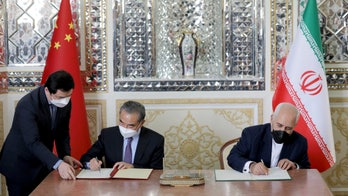 Iran, China sign deal to warn US against isolating them, professor says