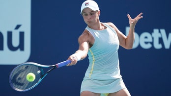 Top-ranked Barty overcomes match point for win at Miami Open