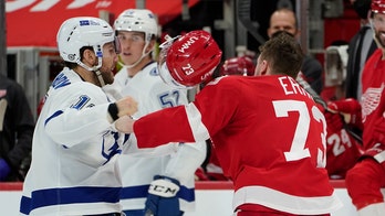 Red Wings' Adam Erne goes down hard after fight with Lightning's Barclay Goodrow