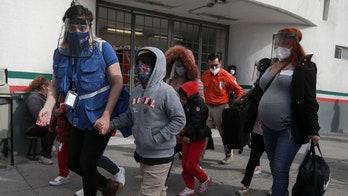 Texas Gov. Abbott reports COVID outbreak, no 'usable running water' at migrant holding facility