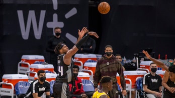 Slumping Kings beat short-handed Lakers 123-120