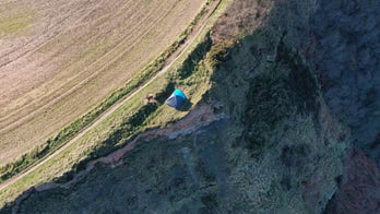 Family scolded for setting up camp on cliff's edge: 'No idea of the extreme danger they were in'